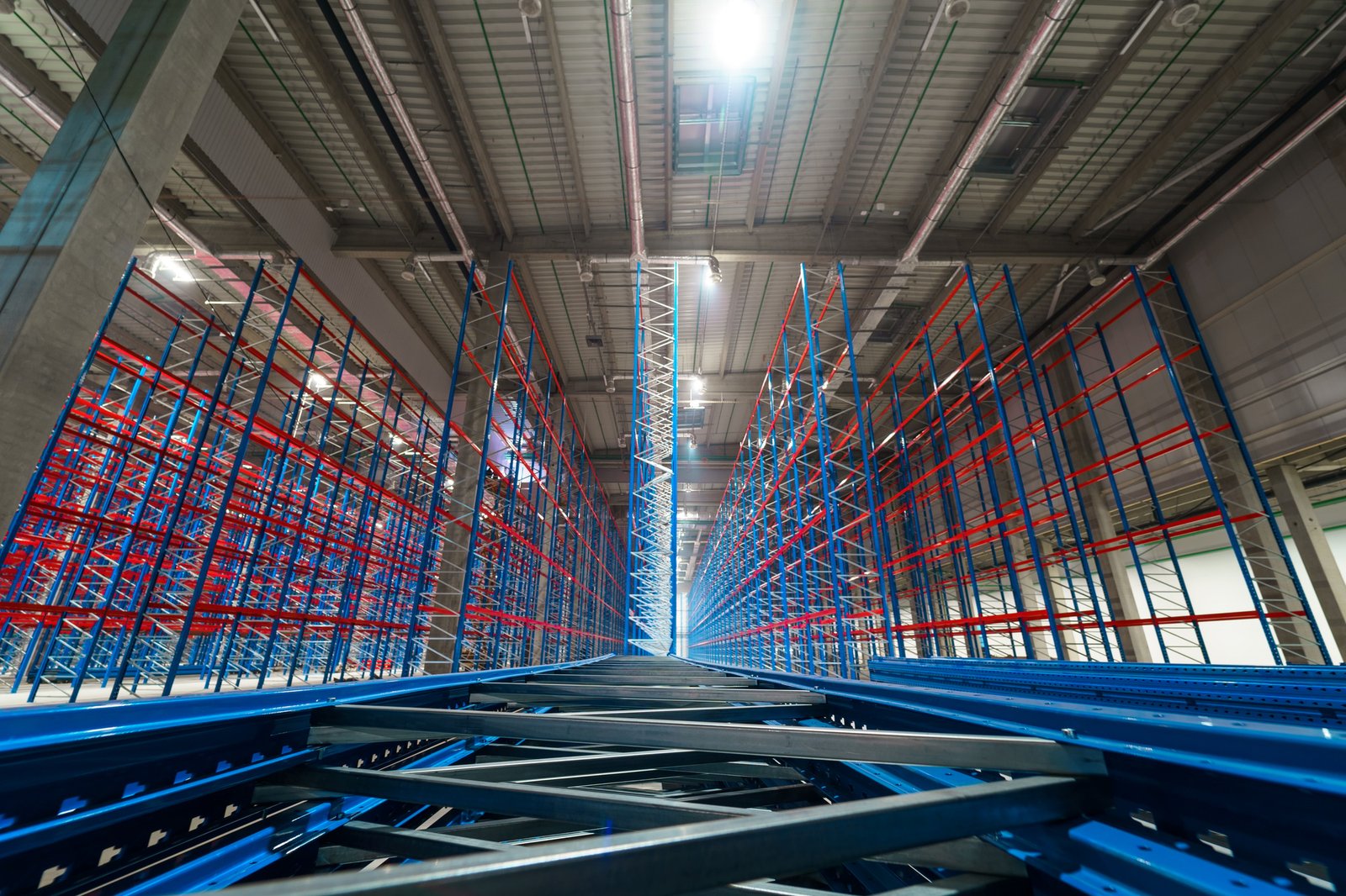 A male architect in an empty commercial warehouse